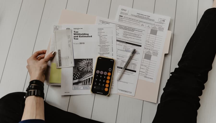 Person with cash at a desk